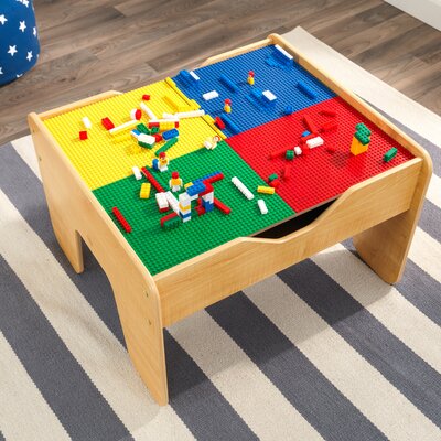 kids activity table with bookshelves